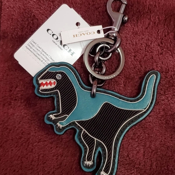Coach rexy keychain